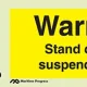 Warning; Stand clear of suspended load - Maritime Progress